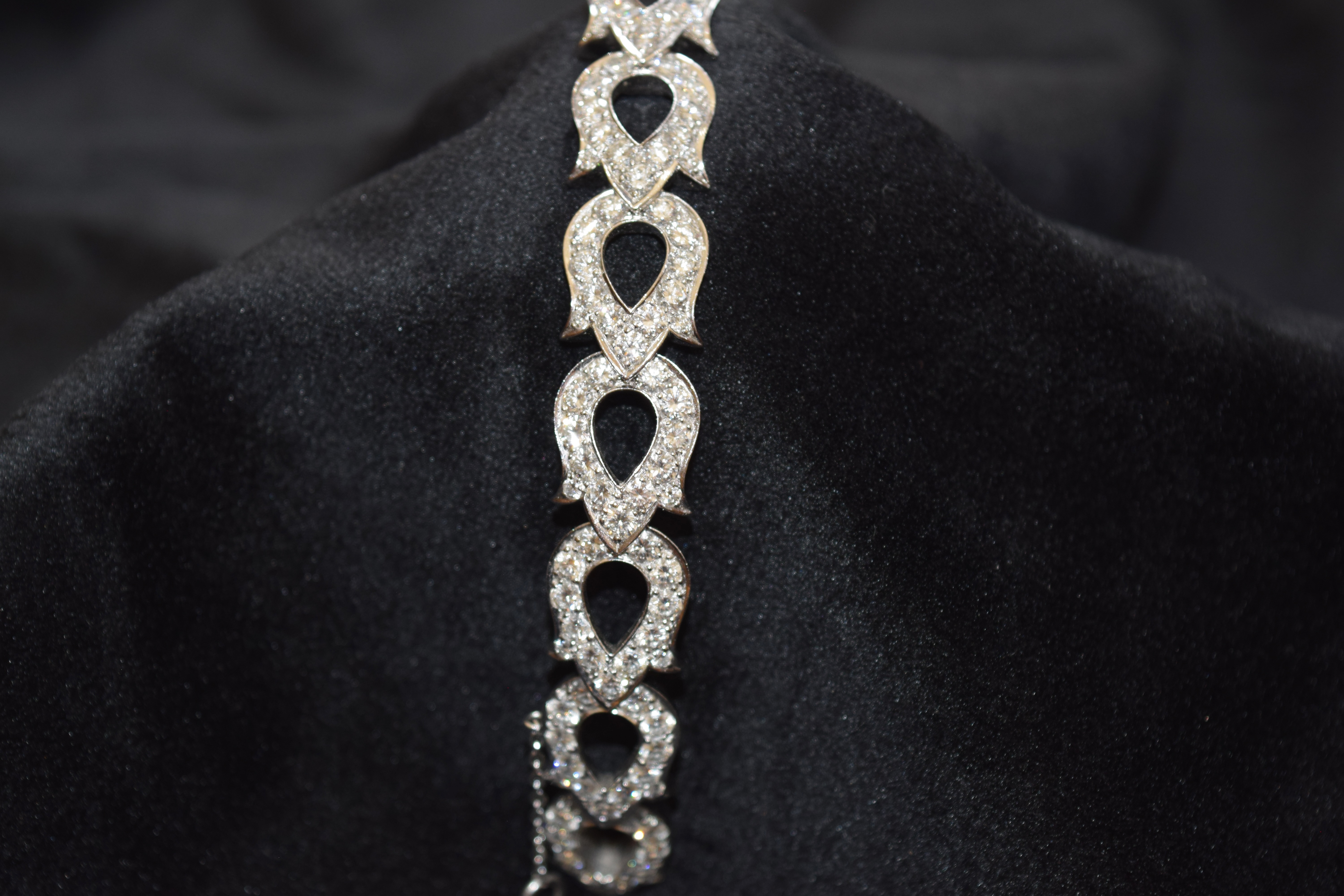 Cartier, Paris, Circa 1990, A fine diamond and 18 carat white gold 'fuchsia' bracelet - Image 6 of 7