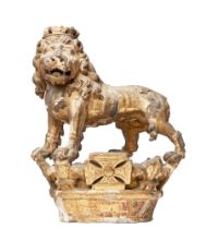 British, Late 17th Century, A carved polychrome and giltwood heraldic pediment