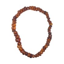 European, Circa 1950, An irregular shaped graduated amber bead necklace