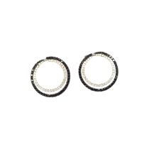 British, Contemporary, A pair of black and white diamond loop earrings