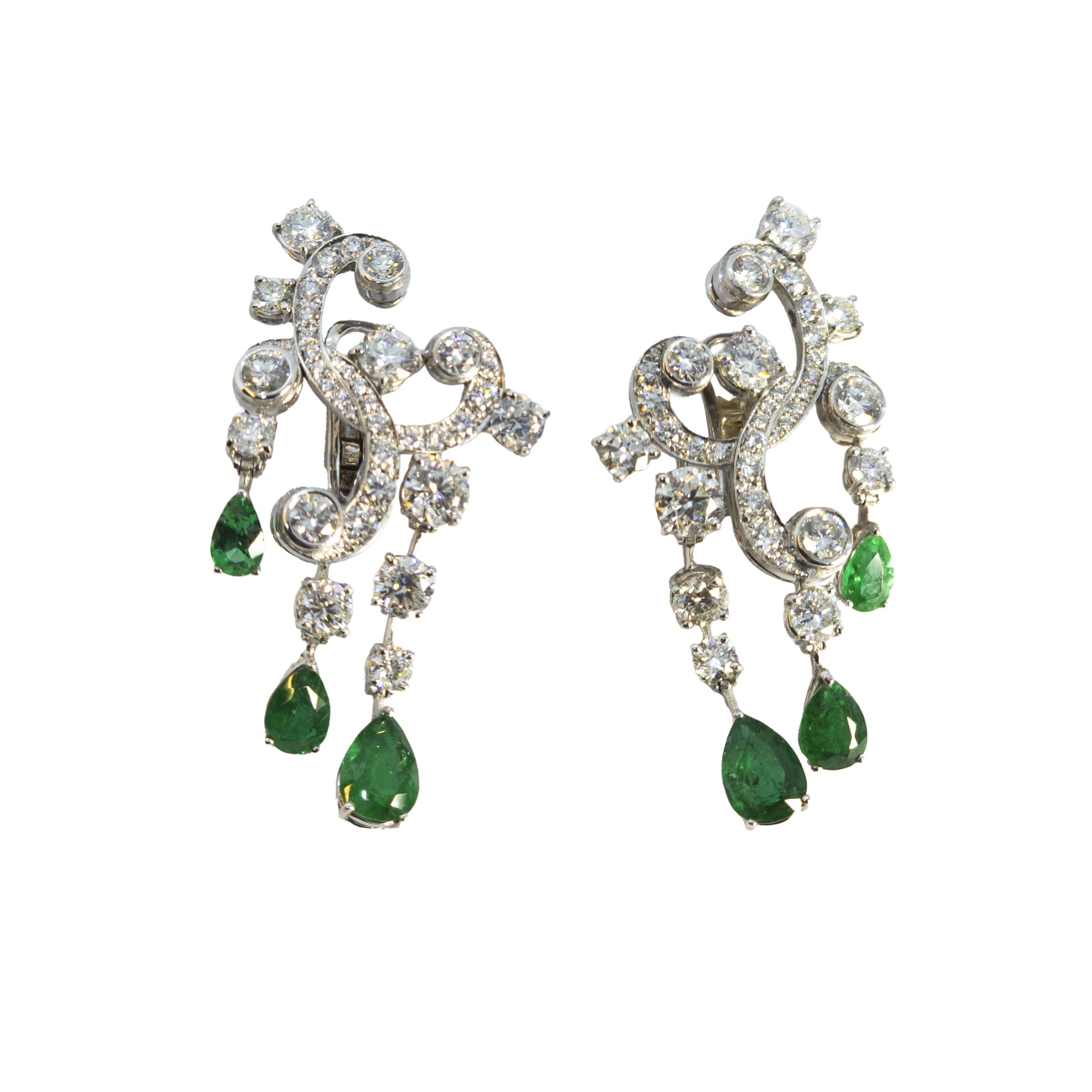 European, Circa 1980, A fine and attractive pair of diamond and emerald earrings