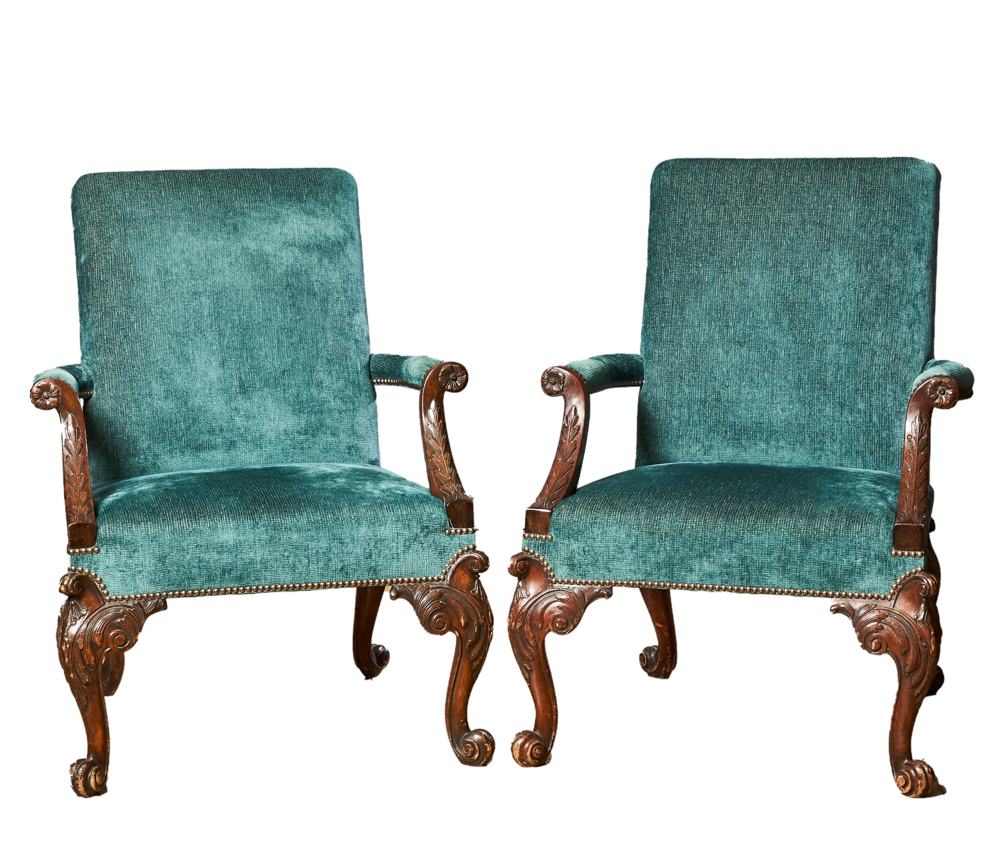 British, George I, A pair of 'Gainsborough' style mahogany upholstered armchairs