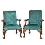 British, George I, A pair of 'Gainsborough' style mahogany upholstered armchairs