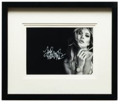 British, Contemporary, A group of four signed photographs of Kate Moss