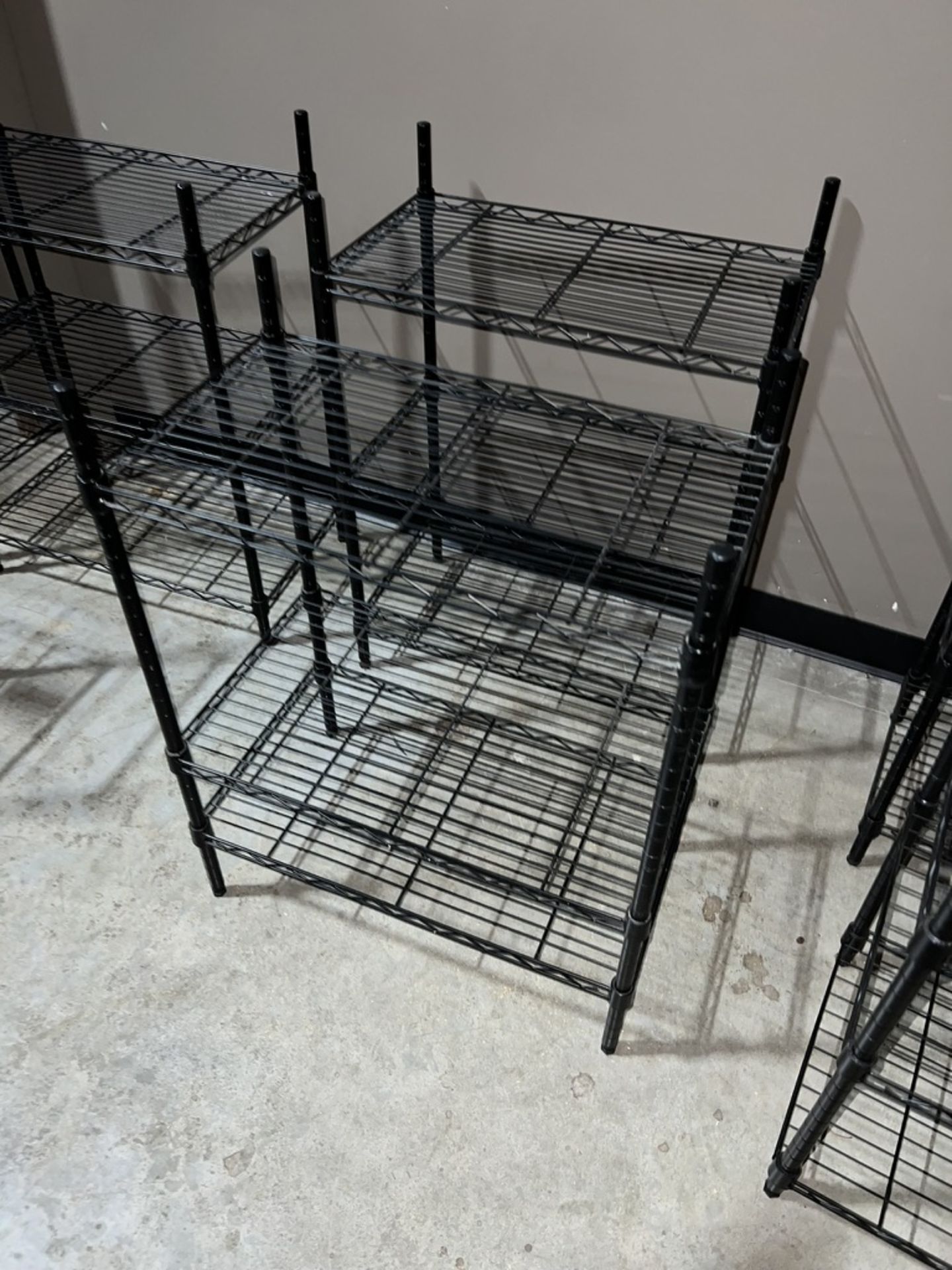 LOT OF: (2) 3-TIER WIRE SHELVING UNITS APPROXIMTELY 24" WIDE