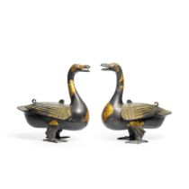 A pair of parcel-gilt bronze 'goose' censers and covers, Qing dynasty, 18th century