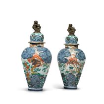 A large pair of Samson porcelain Imari octagonal vases and covers, late 19th century