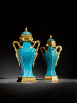 A pair of Louis XV gilt-bronze mounted Chinese turquoise-glaze pot-pourri vases and covers, the