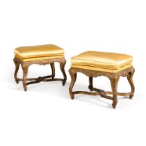 A pair of Régence giltwood stools, early 18th century