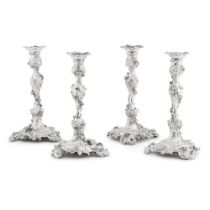 A set of four George II silver candlesticks, Edward Wakelin, London, 1754