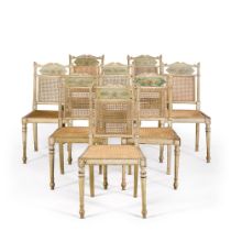 A set of eight George III ivory-painted chairs, circa 1800, in the manner of Henry Holland