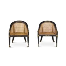 A Pair of Regency Lacquered Brass-Mounted Ebonised and Caned Tub Chairs, Circa 1810