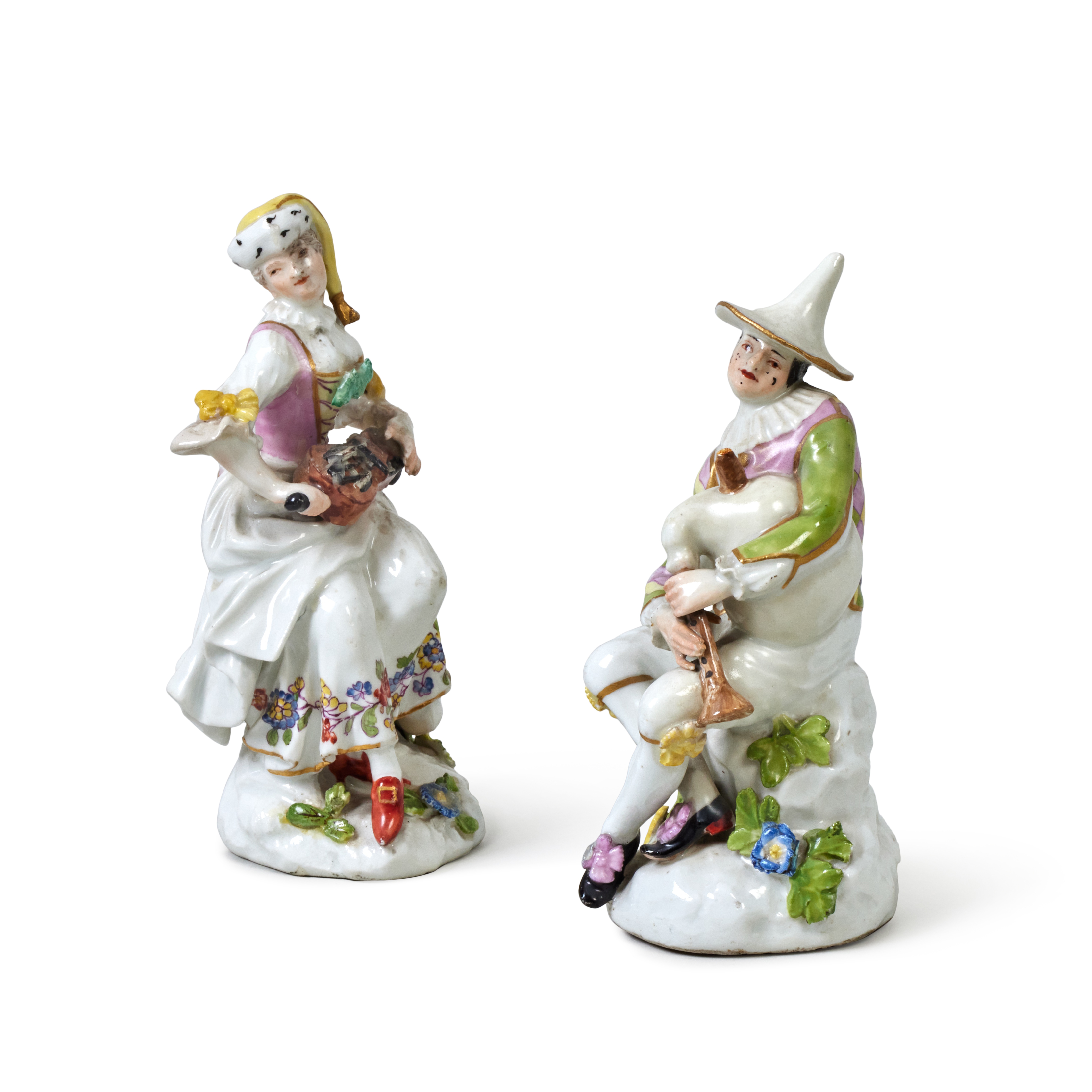 A Meissen Figure of Harlequin Playing Bagpipes and A Meissen Figure of a Lady, Probably Columbine, P