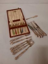 CASED SET OF ENAMELLED SILVER TEASPOONS & SILVER HANDLED CUTLERY