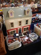 LARGE DOLLS HOUSE WITH ACCOMPANING FURNITURE