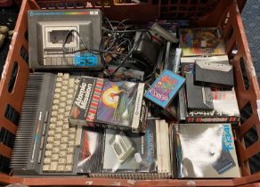 A TRAY OF VINTAGE COMMODORE GAMES ITEMS