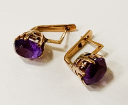 PAIR OF 14CT GOLD PURPLE SAPPHIRE EARRINGS