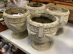 FOUR SMALL GARDEN POTS