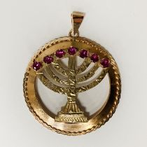14 GOLD MENORAH PENDANT WITH RUBIES - 4.2 GRAMS APPROX