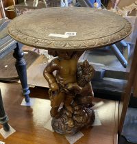 FIGURAL CIRCULAR TABLE