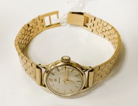 14K GOLD OMEGA LADIES GOLD WATCH WITH GOLD PLATED STRAP