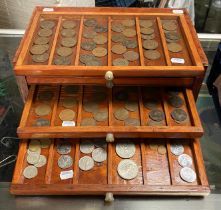 LARGE QUANTITY OF COINS (IN COIN BOX HOLDER)