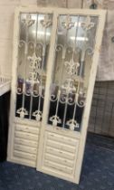 PAIR OF WHITE PANEL GARDEN MIRRORS