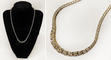 A BEAUTIFULLY CRAFTED 17'' WHITE GOLD & DIAMOND NECKLACE WITH 11.90 CARATS OF BRILLIANT CUT DIAMONDS