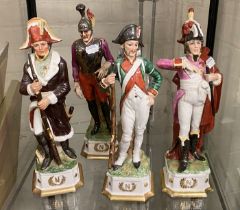 FOUR MILITARY FIGURES