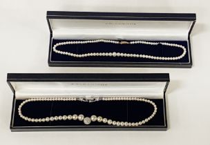 TWO PEARL NECKLACES - BOXED - ONE IS SWAROVSKI , THE OTHER HAS A 9CT GOLD CLASP