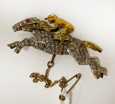 18 CARAT GOLD DIAMOND SET BROOCH IN THE FORM OF A HORSE & RIDER