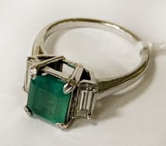 18 CARAT WHITE GOLD RING SET WITH EMERALD CUT NATURAL EMERALD 1.54CT APPROX & 2 BAGUETTE CUT NATURAL
