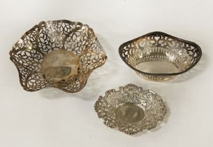 THREE PIERCED SILVER DISHES - 7 IMP OZS APPROX