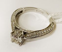 18CT WHITE GOLD DIAMOND RING - CENTRE STONE APPROX 0.60 CARATS - TOTAL APPROX 1 CARAT