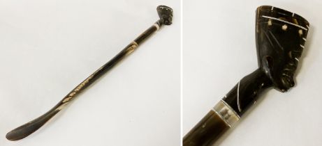 AFRICAN HORN SHOEHORN WITH FIGURAL TOP