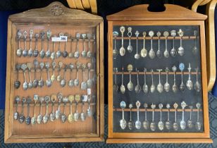 TWO CABINETS OF SILVER PLATED COLLECTORS SPOONS