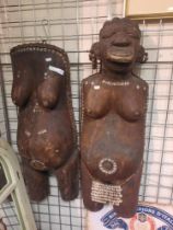 TWO CARVED AFRICAN TRIBAL PLAQUES
