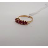 18CT GOLD RUBY FIVE STONE RING - SIZE P