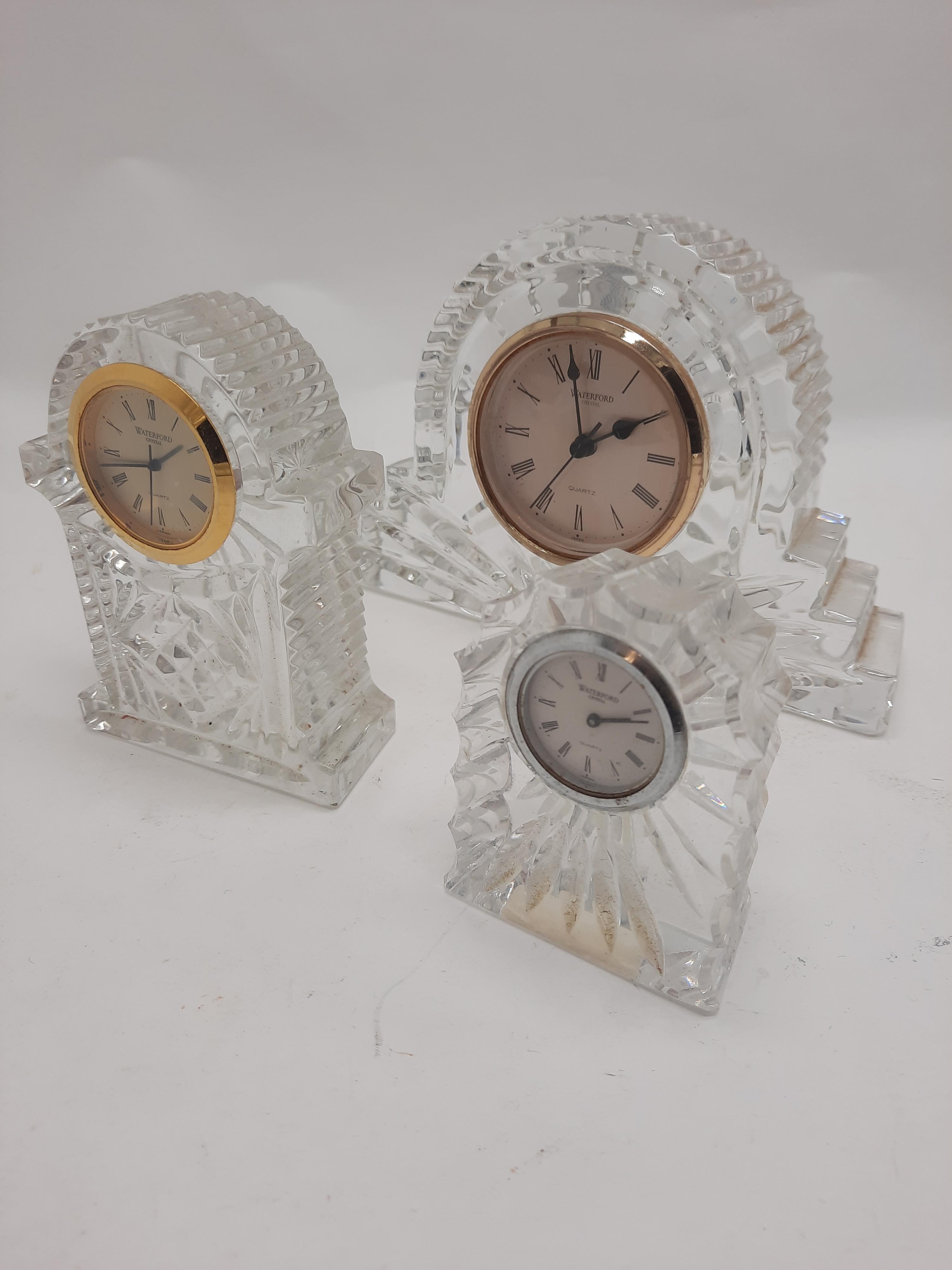 THREE WATERFORD CRYSTAL CLOCKS