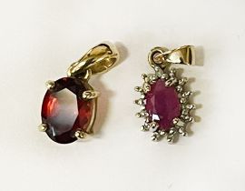 TWO 9CT GOLD GEMSTONE PENDANTS