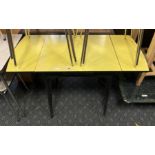 1950'S YELLOW & BLACK FORMICA DRAWLEAF TABLE