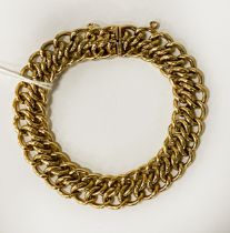 18CT GOLD CURB BRACELET - 65.4 GRAMS APPROX