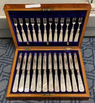 H.M SILVER COLLARED MOTHER OF PEARL CUTLERY SET