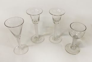 FOUR GEORGIAN (OR LATER) TWIST STEM GLASSES