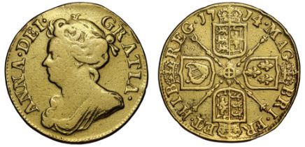 Anne (1702-14), gold Guinea, 1714, Post-Union, third draped bust left, Latin legend and toothed