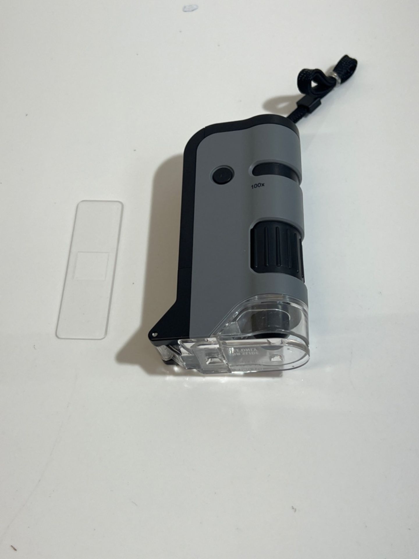 Carson MicroFlip 100x-250x LED UV lighted Pocket Microscope with Flip-Down Slide Base and Smartphon - Image 3 of 3