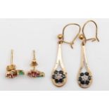 A pair of 9ct gold sapphire drop earrings, 32mm, together with a pair of 9k gold ruby and emerald