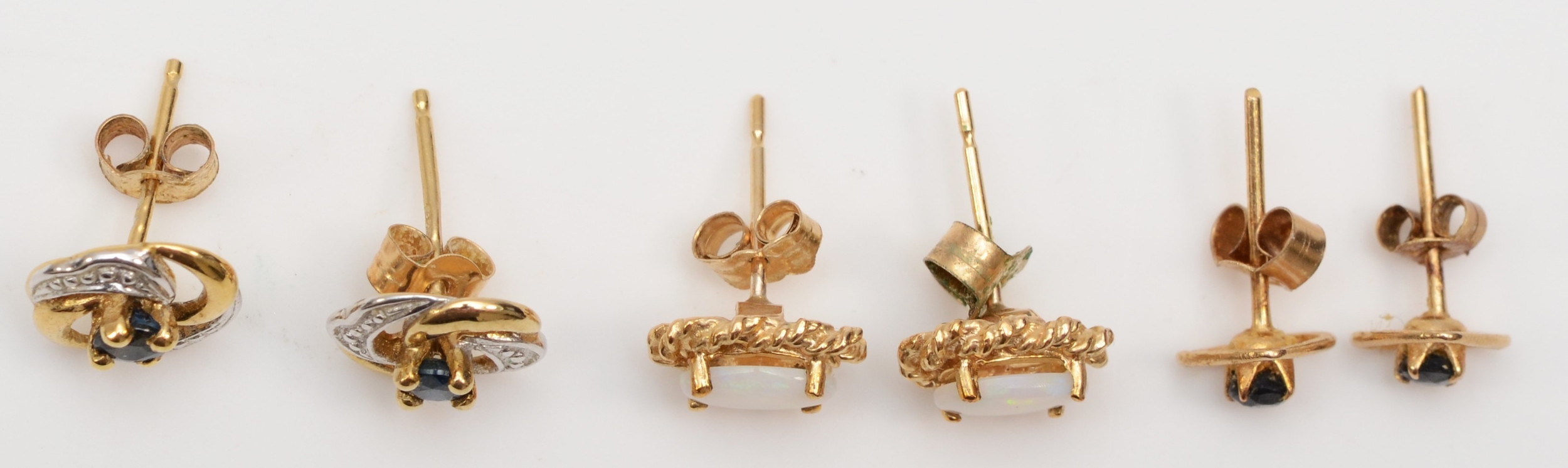 Two pairs of 375 gold stud earrings, opal and sapphire, together with an unmarked gold pair of - Image 2 of 2