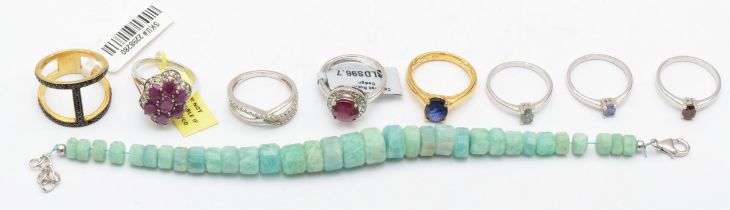 Eight silver gem set rings to include ruby, and a bracelet,