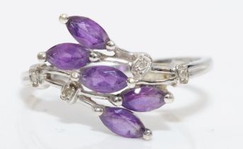 A 9ct white gold amethyst and diamond dress ring, T, 2.5gm.